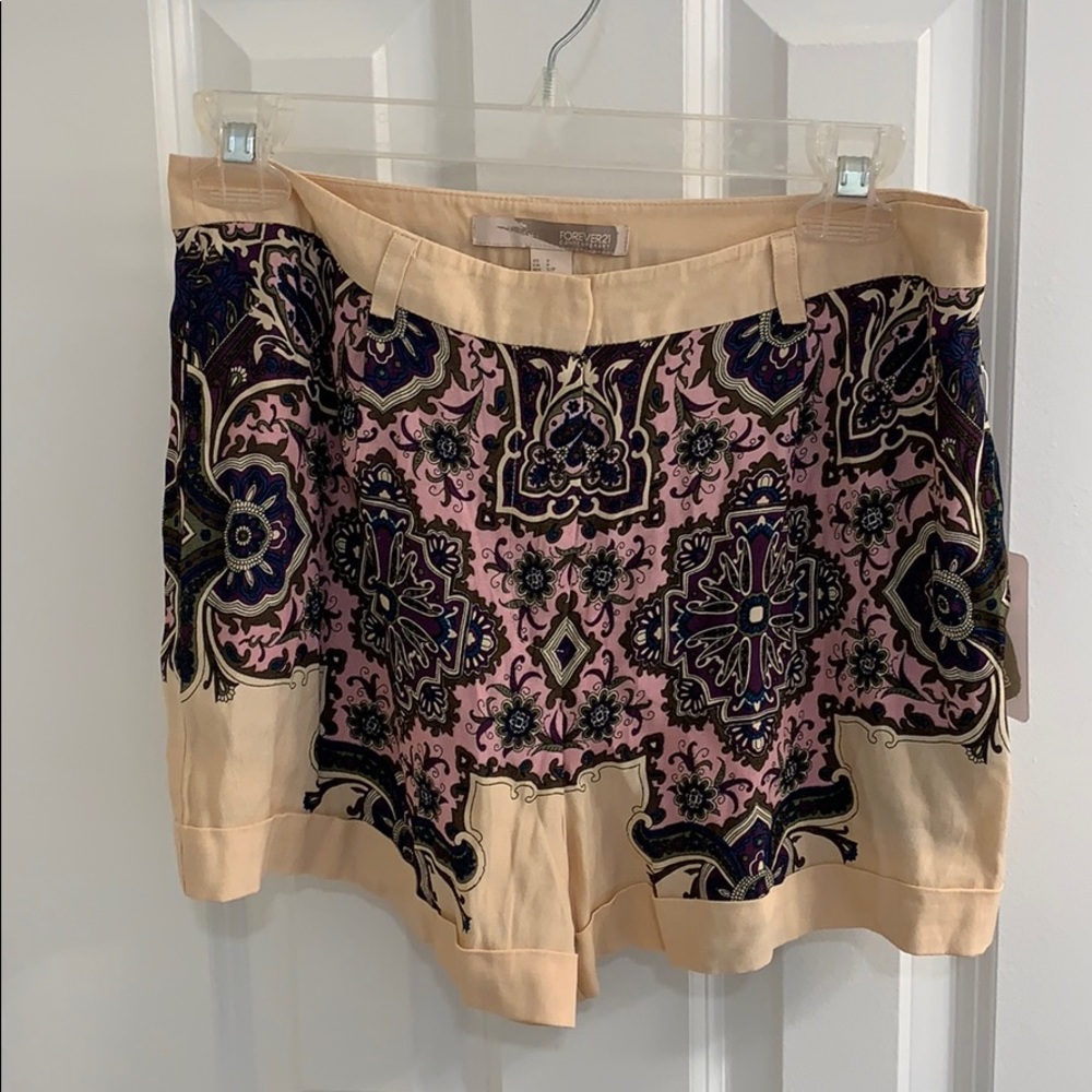 Cream shorts with purple design